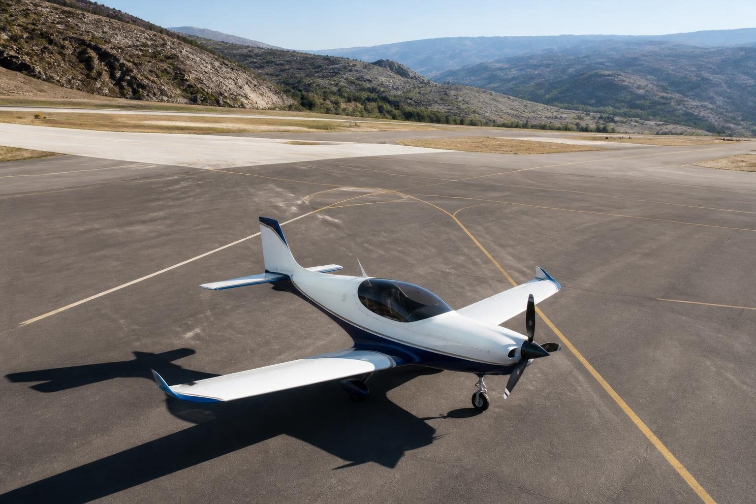 Composite single-engine aircraft at a mountain airport
