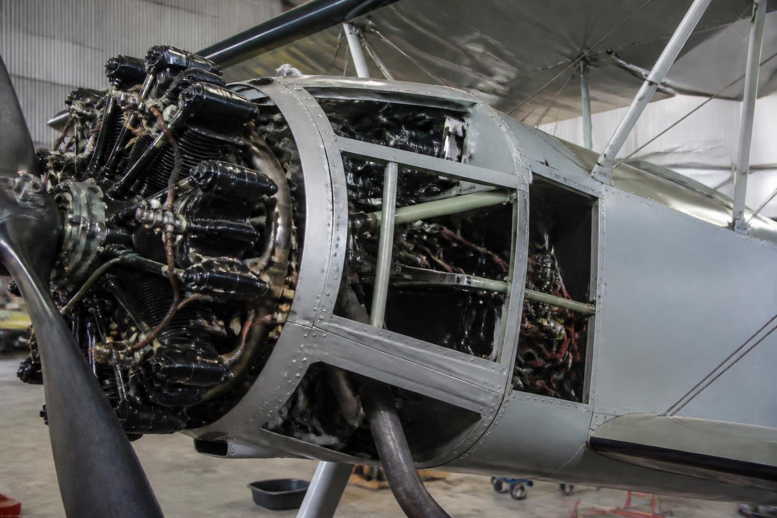 Open radial-engine installation on a vintage biplane