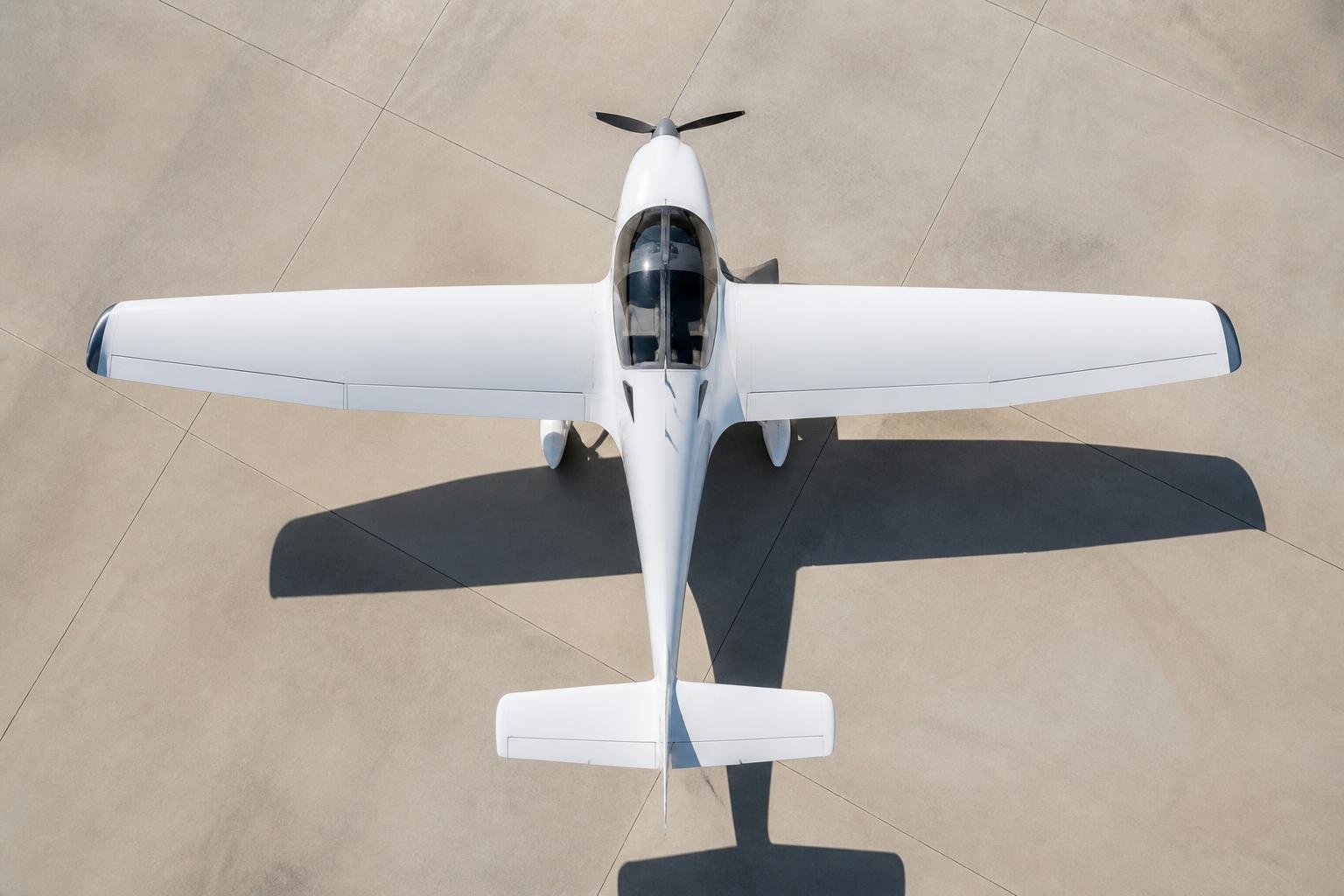 High-wing composite light aircraft viewed from above